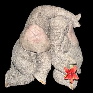 TUSKERS BY SCULPTOR BARRY PRICE